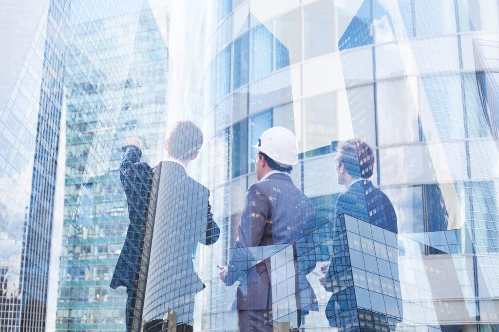 Group of Business People Discussing Real Estate Project