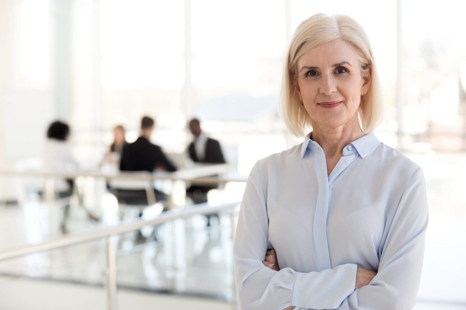 Confident mature businesswoman looking at camera